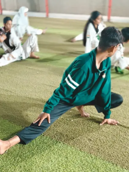 Another student stretching. We make sure every student understands the importance of a proper warm-up and cool-down.