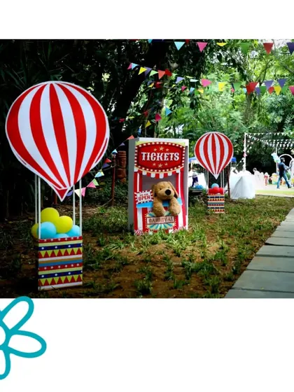 The pathway to the main carnival area was lined with cute hot air balloon props and a ticket booth to build excitement.