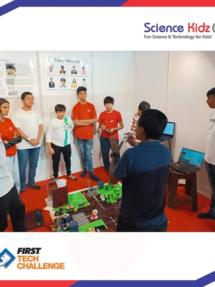 My team stands ready to demonstrate their "Soul City" project at the First Tech Challenge India Championship. This group of dedicated students worked for weeks to create a smart city model with sustainable solutions, showcasing incredible teamwork.