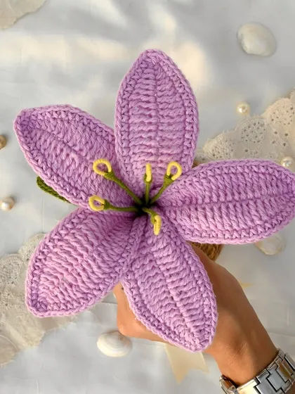 This beautiful lavender-colored large crochet lily is perfect for adding a touch of calm and elegance to your space or as a special gift.
