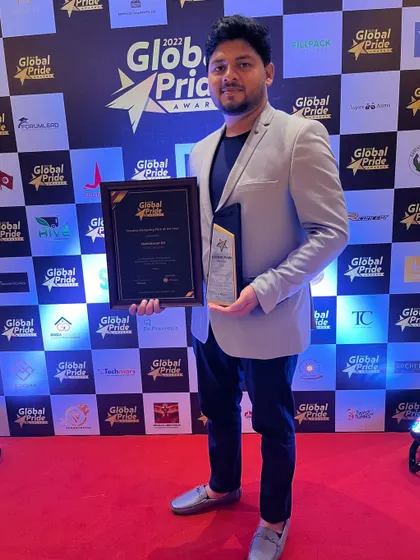 Our founder proudly holding the award and certificate. This recognition motivates us to continue pushing the boundaries of creative and functional interior design.