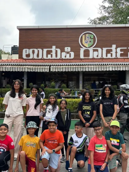 The Young Adventurers group makes a pit stop during their journey to the campsite. The adventure begins the moment they board the bus.