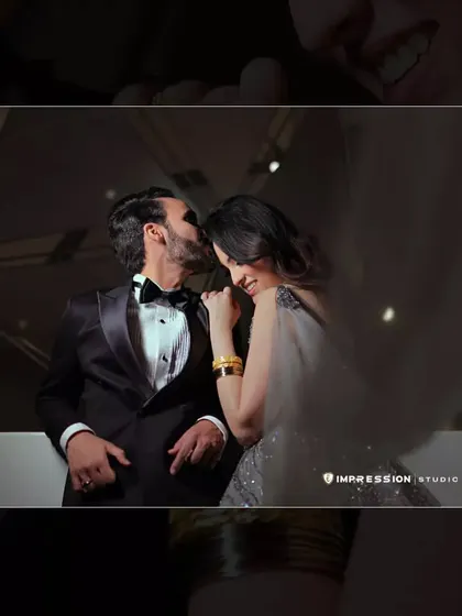 A tender kiss on the forehead. This intimate portrait from a pre-wedding shoot captures the deep affection and care between the couple.