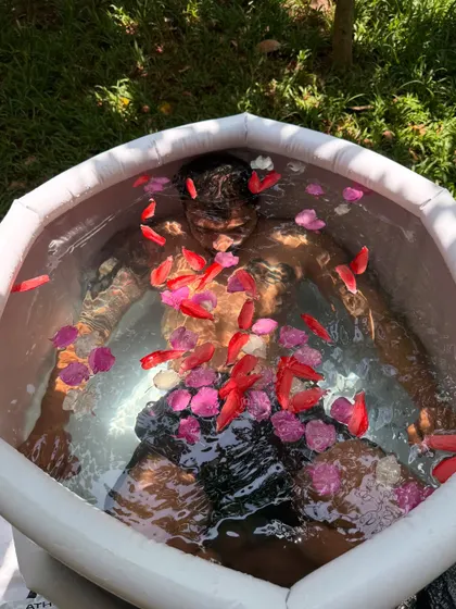 The ice bath is a powerful practice of surrender and resilience. It challenges the mind to find stillness amidst intensity, leaving you feeling incredibly alive, clear, and re-energized. The flower petals are a reminder of the beauty in the process.
