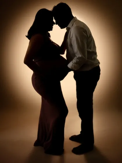 A story of love and legacy told through a powerful silhouette. This frame is a feeling, capturing the connection between two people before their family grows.