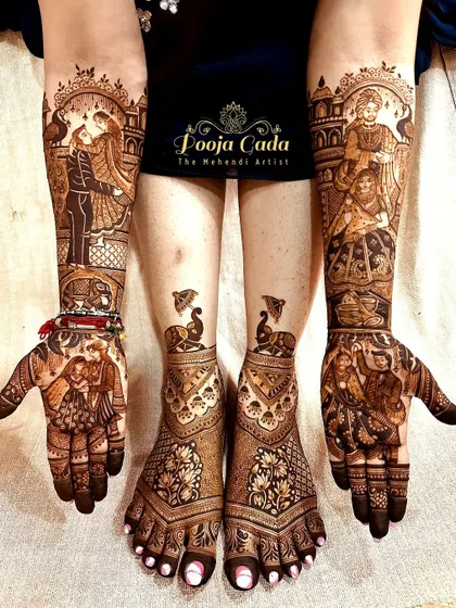 A full bridal set with beautiful lotus and peacock designs on the feet, perfectly matching the heavy figurative work on the hands.