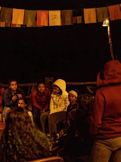 A duplicate of 151, this image of our group around the campfire highlights the warmth and connection that defines our festival nights.