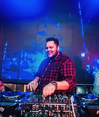 Having fun while doing the job is mandatory. A candid shot of me smiling while working the mixer.