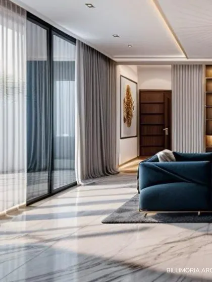 Sunlight streams across the marble floors of this living room, highlighting the contrast between a bold blue sofa and the neutral palette of the surrounding space. Sheer curtains diffuse the light, creating a soft, serene glow.