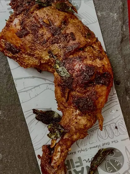 Another look at the Al Faham Chicken, with its perfectly charred skin and juicy meat. This isn't just another chicken dish; it's a bite of migration, memories, and midnight cravings.