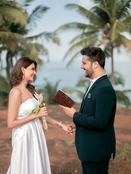 Reading vows from a personal journal against the backdrop of Goa's palm trees. This is what old school love looks like. It’s these personal touches that make each proposal unique.