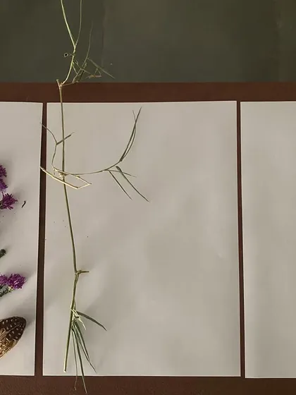 A minimalist arrangement with bamboo, created by a visitor.