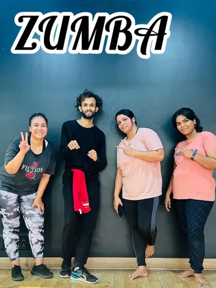Another look at our members during a Zumba toning session. We believe in a holistic approach to fitness, combining cardio dance with muscle conditioning.