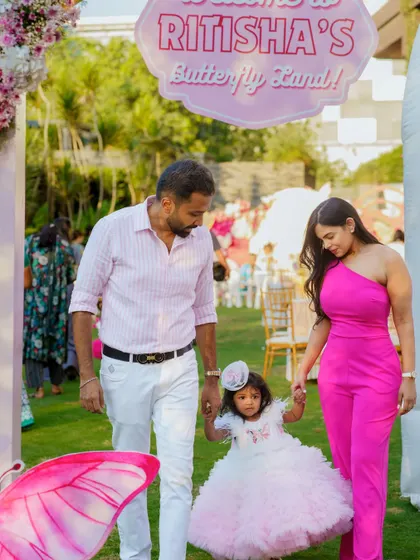 The grand entrance to a butterfly themed birthday party. We capture the family's joy and excitement as they celebrate their little one's special day together.