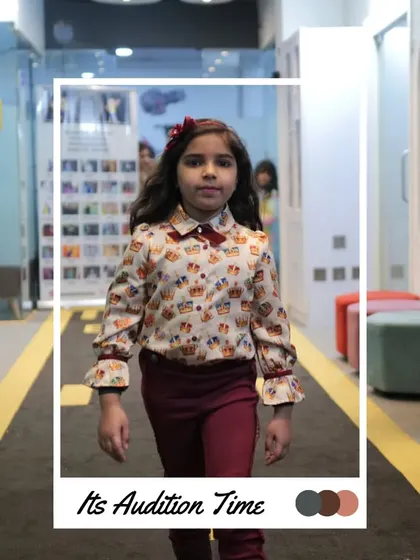 This participant looks sharp in a patterned shirt and bow tie, ready to impress the judges.