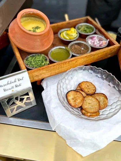 A lesser-known but incredibly delicious dish from the streets of Moradabad. Our Muradabadi Dal is slow-cooked to a creamy consistency and served with crispy, flaky Biscuiti Roti and a variety of toppings.