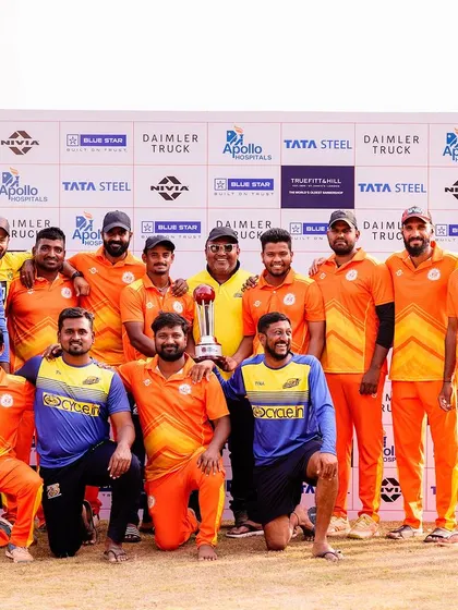 A duplicate photo of a team posing with their trophy after the tournament.