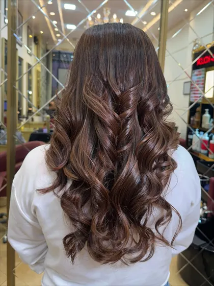 The shine on this Hazelnut Mocha color is incredible. Healthy hair is always our top priority during any color service.