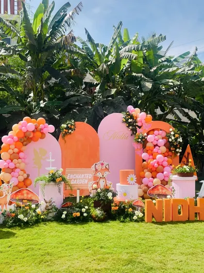 A wide shot of the enchanted woodland setup in a sunny outdoor location, showing how our designs integrate beautifully with natural surroundings.