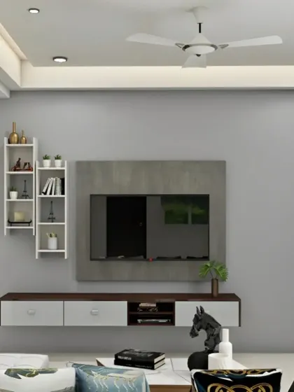 A minimalist approach to the entertainment center, this design features a simple floating console and a concrete-finish TV back panel. The asymmetrical wall shelves add a touch of modern style.