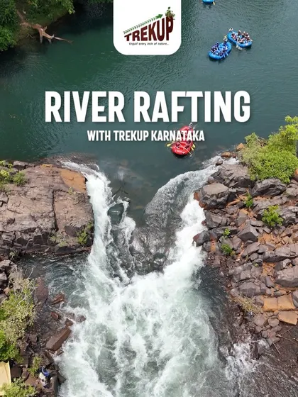 An aerial view of river rafting in Dandeli, showing the excitement of navigating the rapids. This is a key part of our Dandeli adventure packages.
