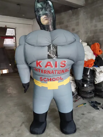 A custom Batman inflatable suit, also made for a school event. The muscular chest details and mask are all part of the inflatable design.
