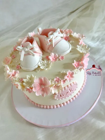 Another view of this sweet pink and white baptism cake.