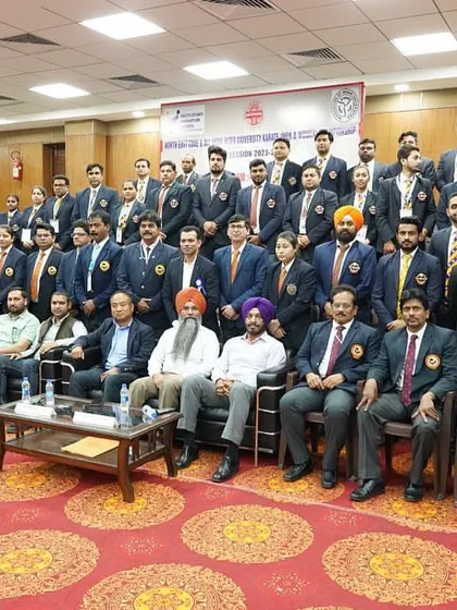 A series of photos showing the dedicated group of officials, judges, and technical committee members from the North East Zone & All India University Karate Championship. It takes a large, coordinated team to run a successful national-level event.
