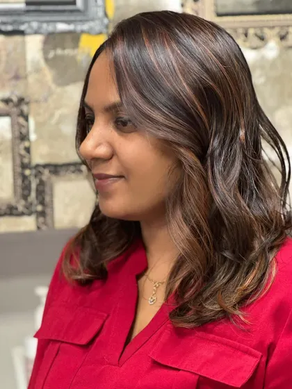 Another shot of her beautiful copper hair, a testament to a long-standing client relationship.