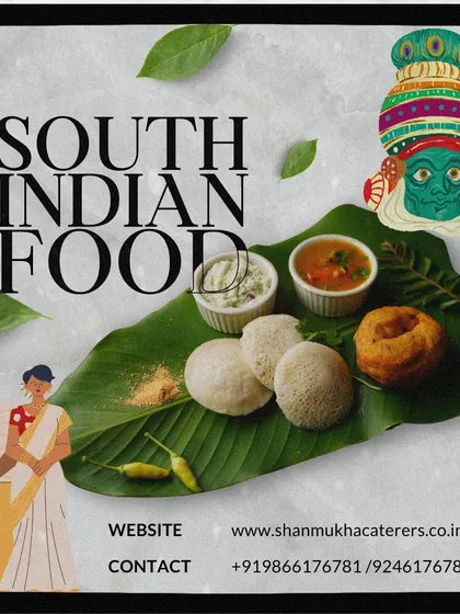 A classic South Indian breakfast of idli and vada served on a banana leaf, representing the simple, delicious, and pure vegetarian food we are known for.