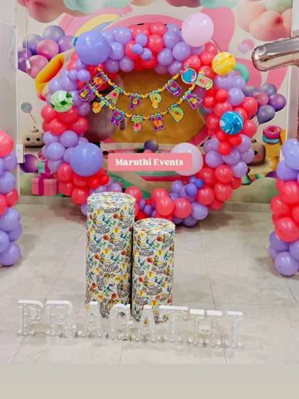 A colorful balloon ring for Pragati's first birthday, using a variety of bright colors.