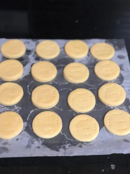 Before the magic happens. These are classic melt in your mouth butter cookies, perfectly shaped and ready to be baked before we start our decorating session.