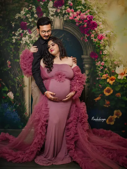 A duplicate of 209, this image captures the deep connection between the couple as they await their little one.