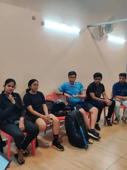 A group of participants listening intently during the pre event briefing. Ensuring players are well informed is key to a smoothly run tournament day.