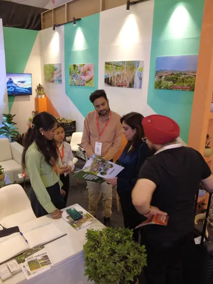 Here I am showing our portfolio to a group of interested attendees at FOAID. It's always a pleasure to walk people through my past projects and discuss their own ideas.