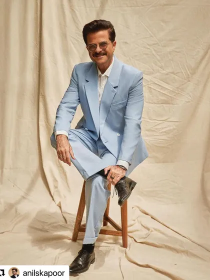 Anil Kapoor looking happy and confident with his styled hair at TIFF.
