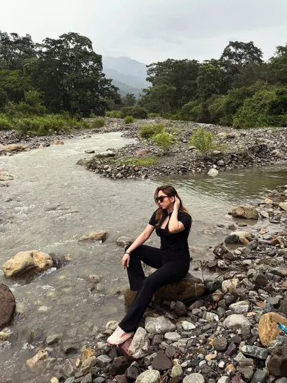 Showing my explorer side with this serene moment by a river in Jim Corbett. This type of content connects with audiences looking for nature getaways and showcases my ability to create beautiful travel stories in any setting.