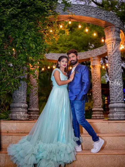 Another beautiful pose at the stone gazebo, showcasing the elegance of the setting.