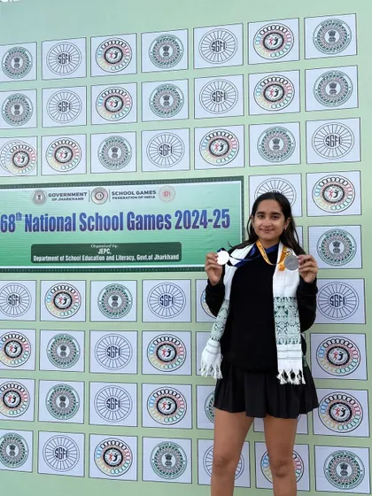 Divya Ungrish proudly displaying her Silver and Bronze medals at the 68th National School Games. Her success is a direct result of the rigorous training and competitive exposure we provide.