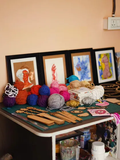 A corner of my creative space, filled with yarn, art supplies, and inspiration for upcoming workshops.