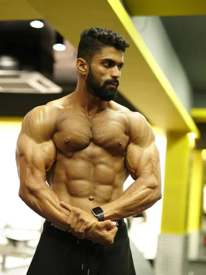 Winners never quit. This is the mindset we build. This photo shows the upper body conditioning required for competition, from developed pecs to a shredded core.