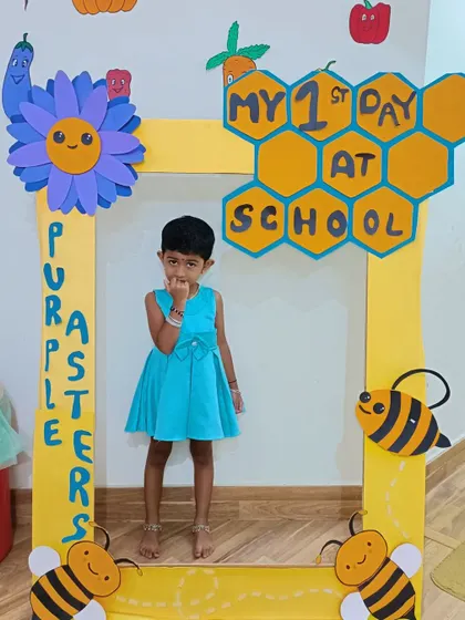 A shy but sweet pose from a new student on her first day at school.