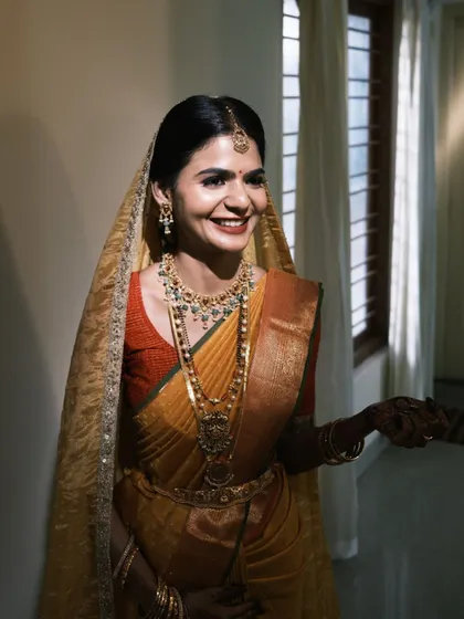 A candid, joyful moment. The bride's makeup is designed to be long-lasting, ensuring she looks perfect even through the most emotional parts of her day.