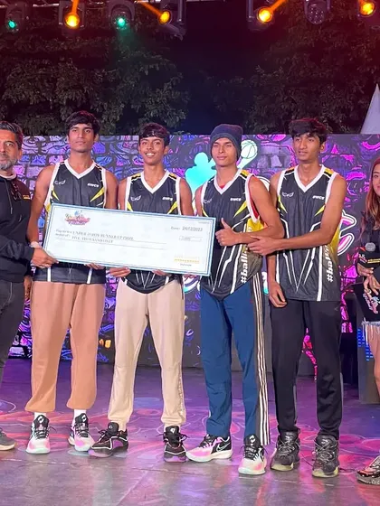 The team receiving their prize at the Dunk Street festival. We learn from every game and come back stronger.