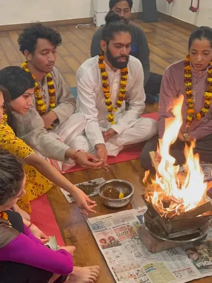 A sacred Hawan (fire ceremony) during our Yoga Teacher Training Course. This ancient Vedic ritual is performed to purify the environment and the participants, marking a significant step in their spiritual journey.