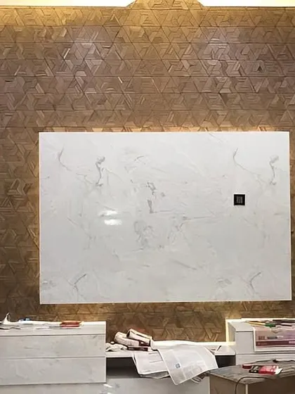 This is a close-up of a TV unit we supplied, featuring a stunning 3D wood covering. The geometric pattern adds texture and a modern artistic touch, turning a simple wall into a captivating feature.