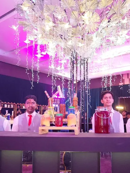 A truly magical setup featuring a bar topped with a custom-built, illuminated crystal tree. This kind of statement piece elevates the entire venue, making the bar a central and unforgettable feature of the event.
