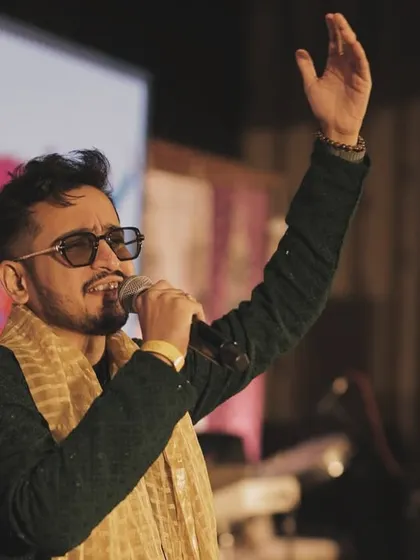 A close-up shot during my performance at the "Range Sange Shubh Avsar" Garba night in Surat. I love singing these traditional songs that have been passed down through generations.
