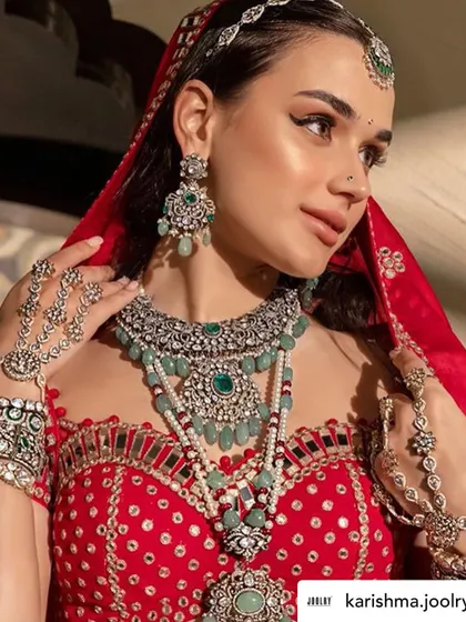 A close-up on the model's expression and the stunning necklace. In jewellery photography, the model's look must complement the product, and we direct them to achieve that perfect synergy.