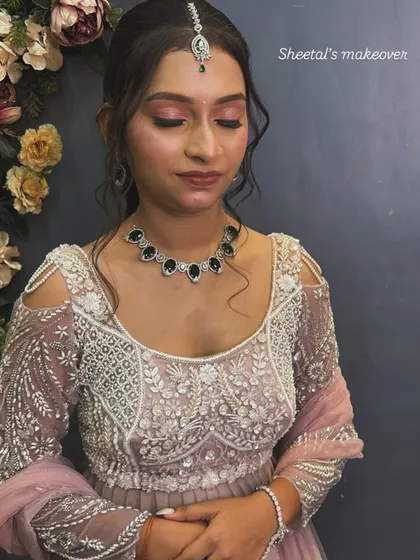 A close up of this soft glam makeup look. The pink eyeshadow and glowing skin create a radiant and elegant effect, perfect for an evening function.